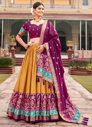 Mustard Tussar Silk Traditional Wear Foil Printed Lehenga Choli