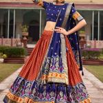 Orange Tussar Silk Traditional Wear Foil Printed Lehenga Choli