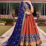 Orange Tussar Silk Traditional Wear Foil Printed Lehenga Choli