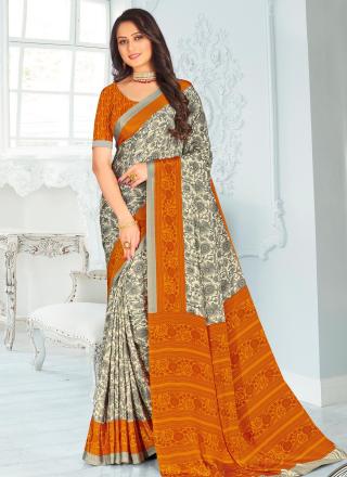 Digital printed crepe silk traditional saree in cream and orange for women